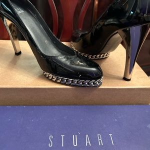 Stuart Weitzman Leather and chains .